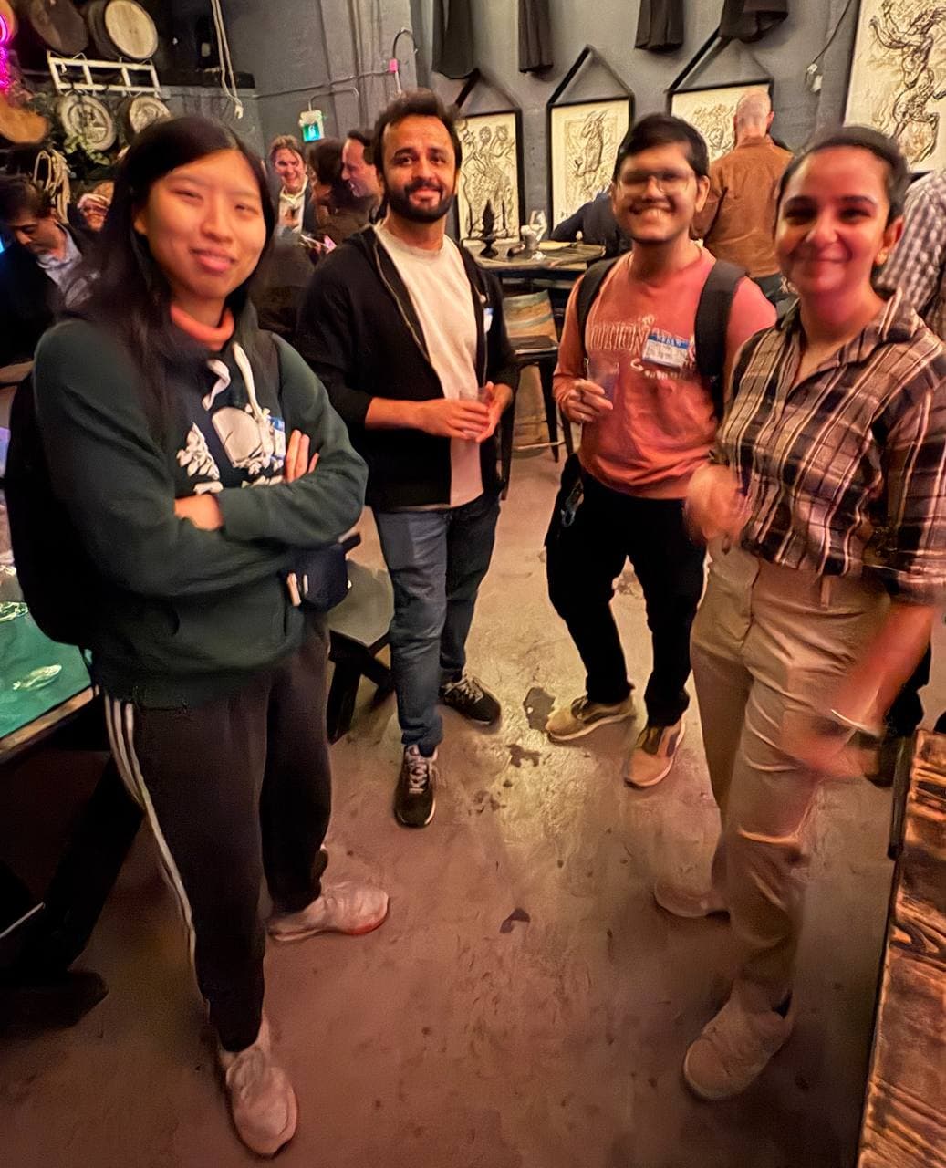 Four guests between the tables in Toronto