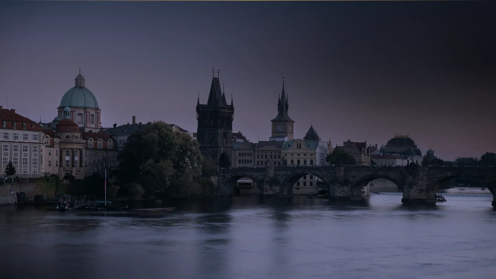 Charles Bridge and Prague's Old Town at dawn