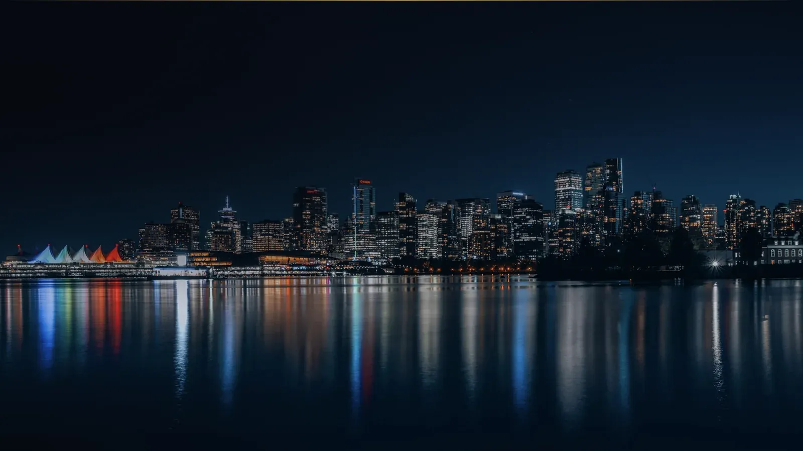 Downtown Vancouver across the water at night